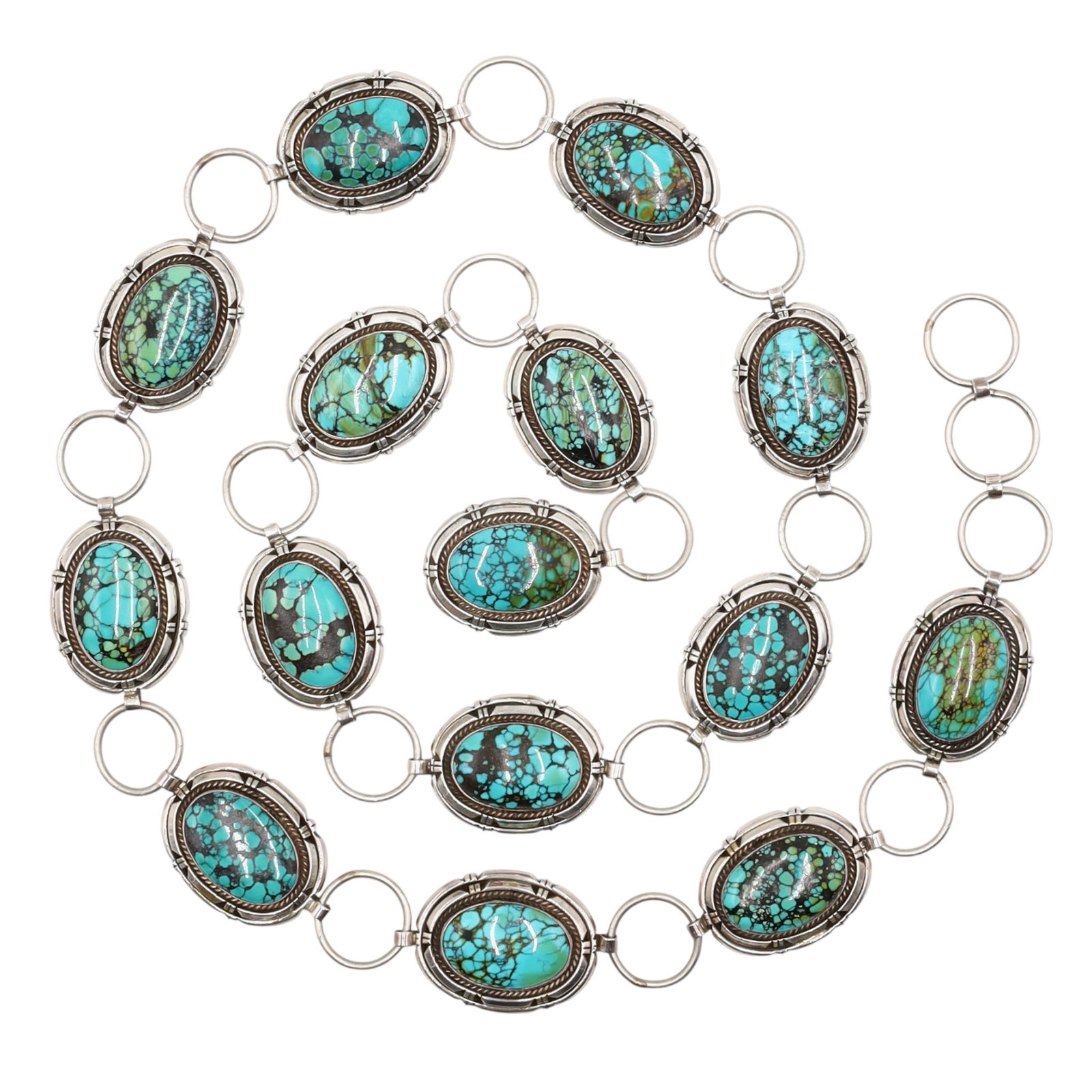 Rita Touchine Navajo Sterling Turquoise Concho Belt: Rita Touchine Navajo Sterling Turquoise Concho Belt | Weight: 359g | Adjustable Length - Total Length: 42" | Concho links are approximately 2" x 1.3" | Circle links are .9" in diameter | Some conchos 