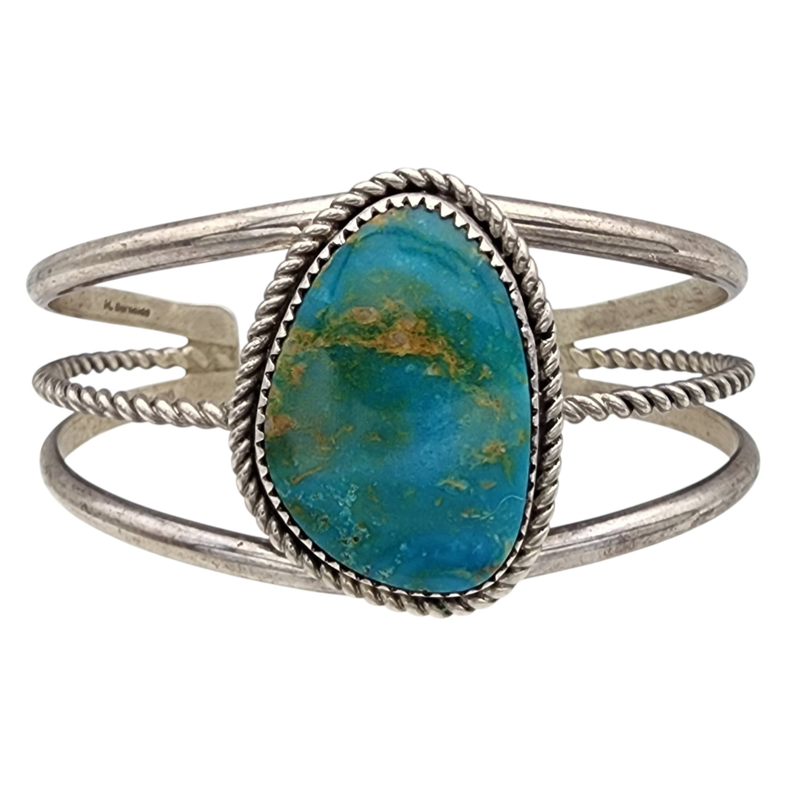 M. Burnside Navajo Sterling Turquoise Cuff Bracelet: M. Burnside Navajo Sterling Turquoise Cuff Bracelet | Weight: 29g | | Approximate Inner Circumference (Including Gap): 6.5" | Gap: 1.25"