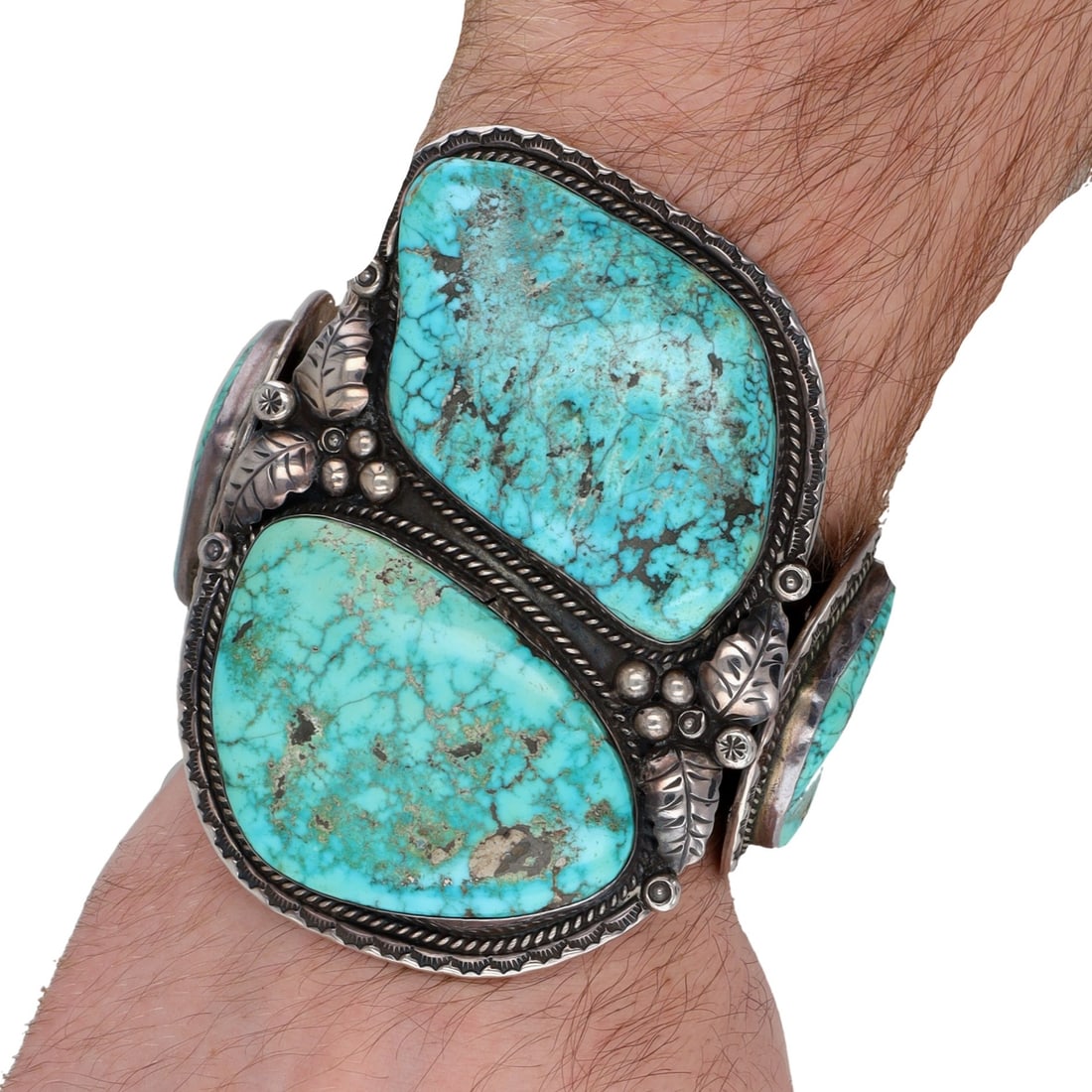 HUGE Teddy Goodluck Navajo Sterling Kingman Turquoise Cuff Bracelet: HUGE! Vintage Teddy Goodluck Navajo Sterling Kingman Turquoise Cuff Bracelet | Weight: 178.2g | Approximate Inner Circumference (Including Gap): 6.75" | Gap: 1.25" | Front Face Measurement: 3.5" x 2.5