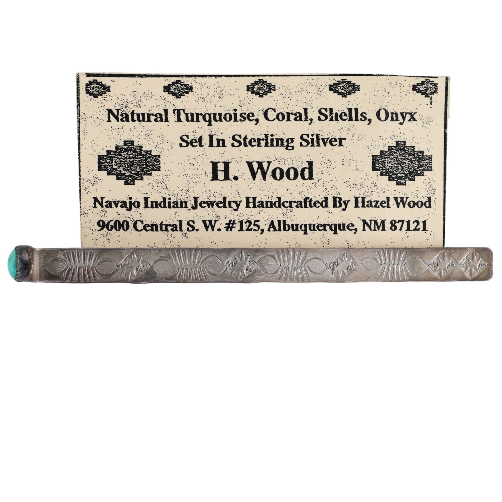 Vintage Hazel Wood Navajo Sterling Turquoise Stamped Bookmark: Vintage Hazel Wood Navajo Sterling Turquoise Stamped Bookmark | Weight: 6.3g | 4.3" long x .3" wide | Comes with business card of artist. Very pretty turquoise cab!