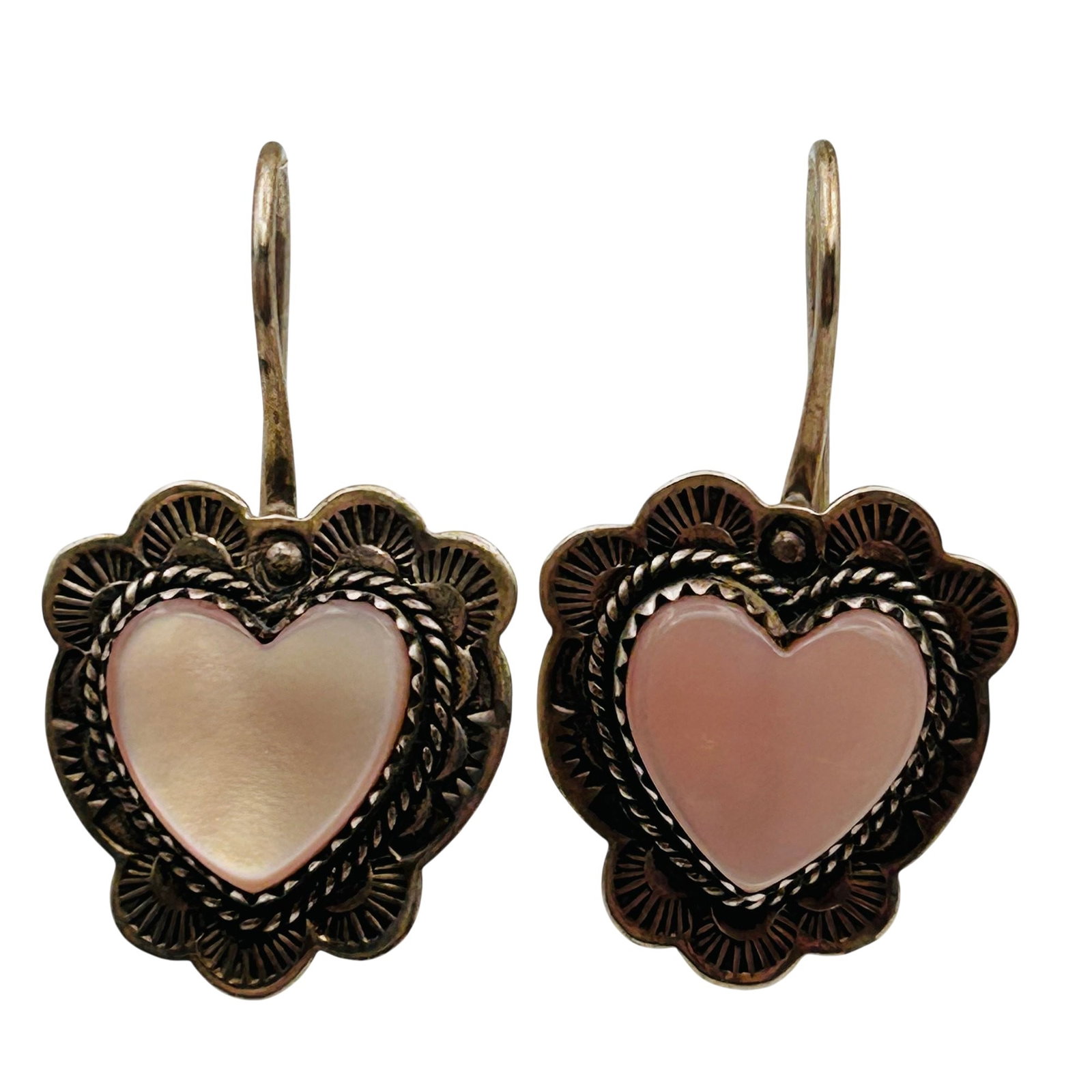 Yazzie Navajo Sterling Mother Of Pearl Earrings: Yazzie Navajo sterling mother of pearl earrings 7.4g —hook back heart shaped earrings