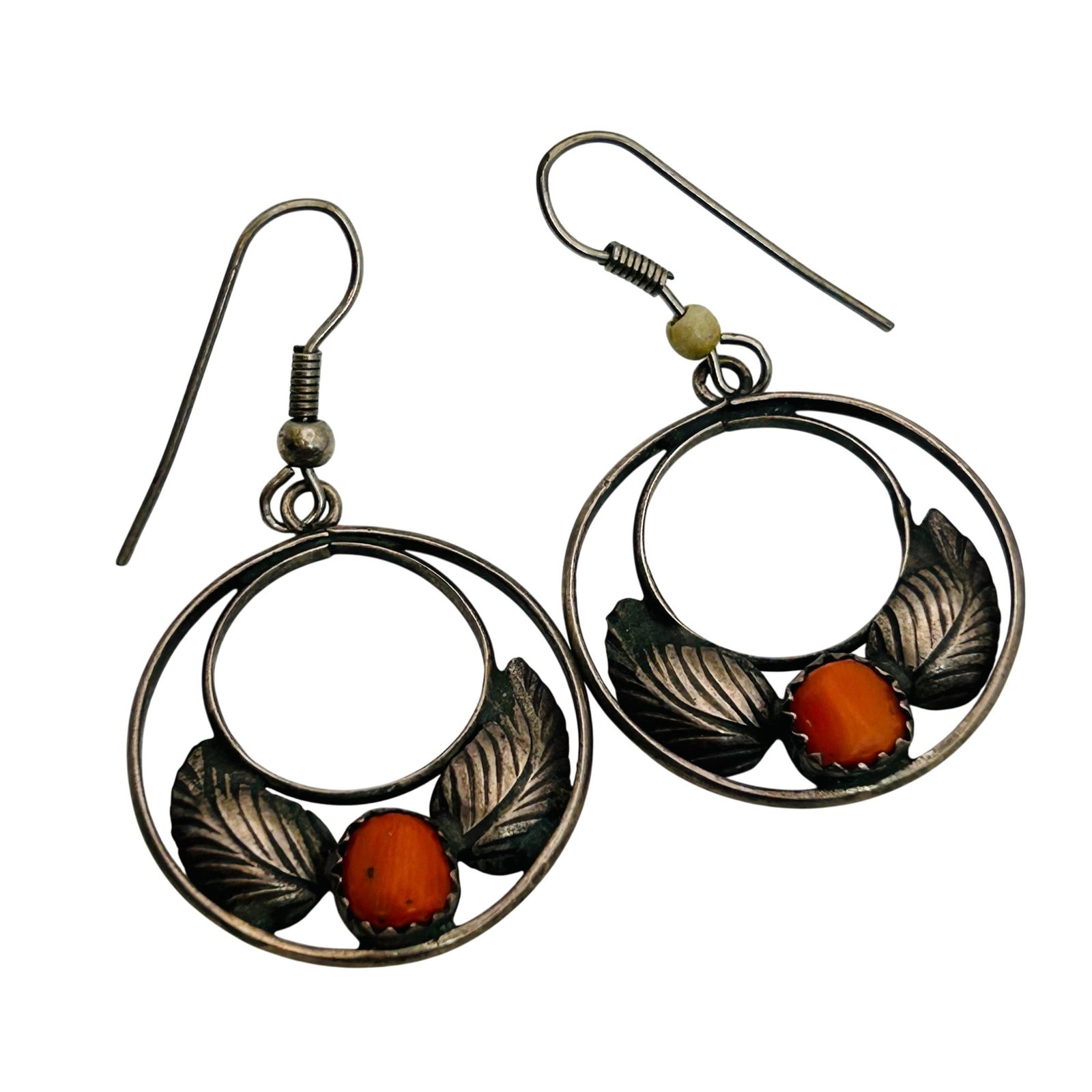 Navajo Sterling Coral Earrings: Navajo sterling coral earrings 4.8g —Circle cut out dangle earrings