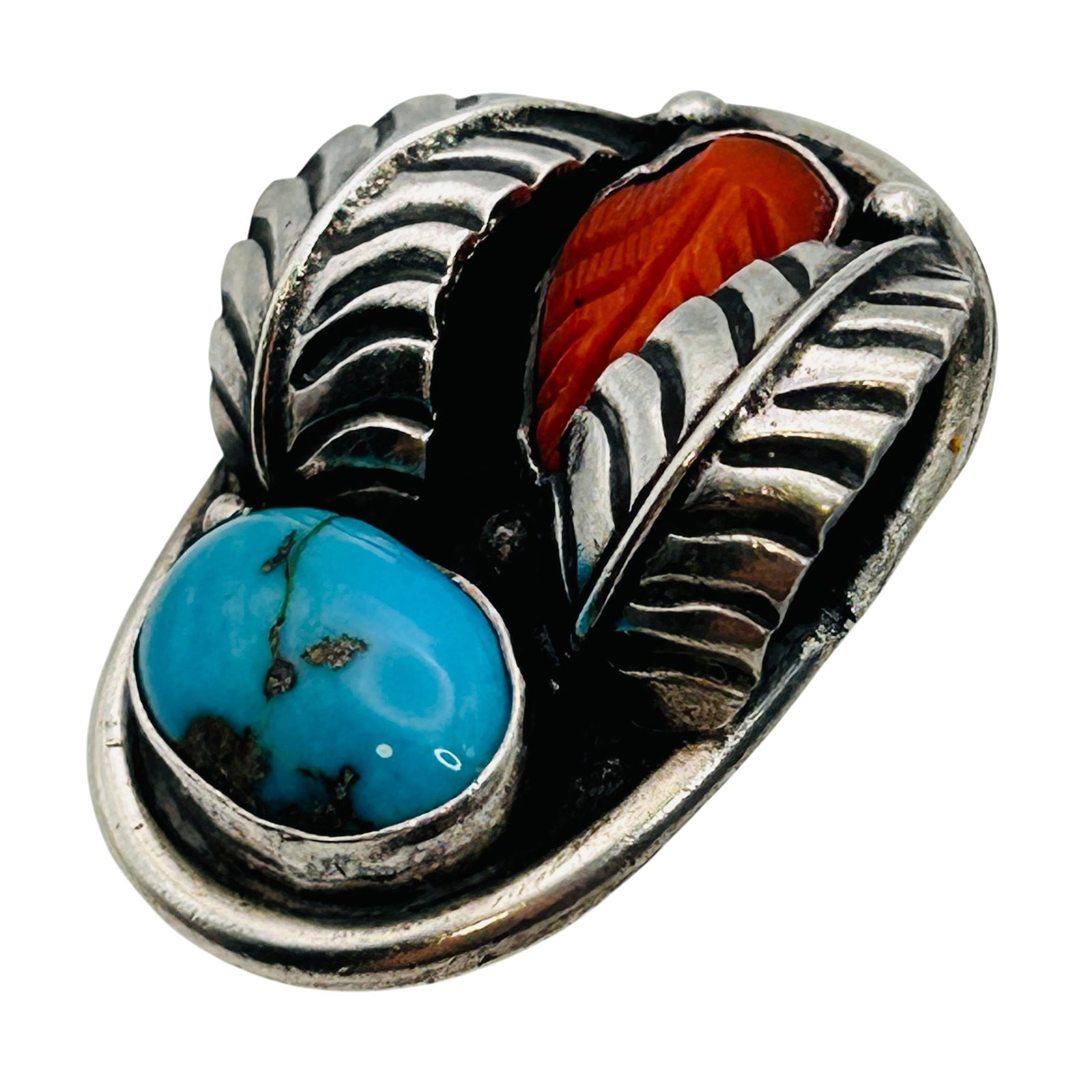 Signed Navajo Turquoise Coral Sterling Pendant: Signed R.B.L Navajo sterling pendant 8.3g —Turquoise carved coral feather detail. Possible date “9181913”
