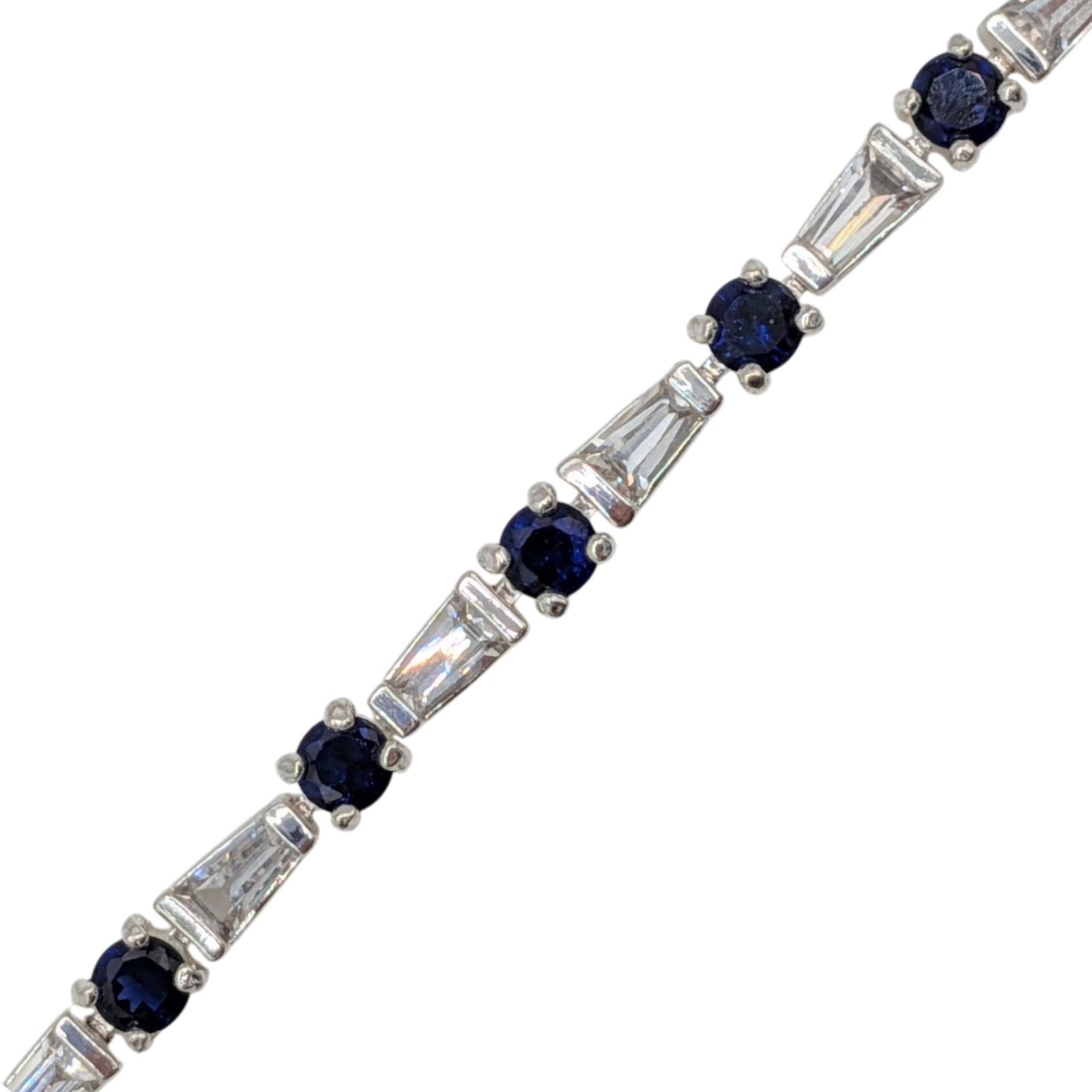 Signed Sterling Silver Sapphire CZ Tennis Bracelet: Signed Sterling Silver, Sapphire, CZ Tennis Bracelet. 7.5in Length. Signed BBI 925. 10.9g