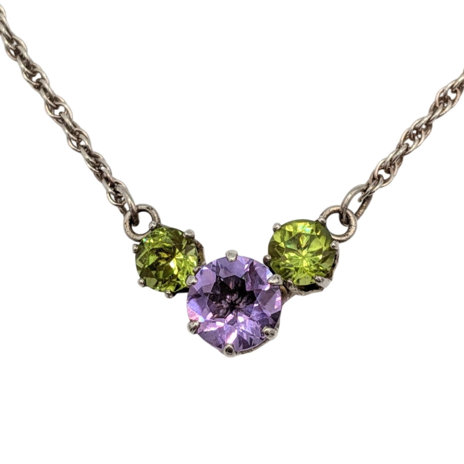 Signed Sterling Silver Amethyst Peridot Triple Cluster Necklace: Signed Sterling Silver, Amethyst Peridot Triple Cluster Necklace. Signed 925 double diamond C RNM 925. 18in Length 1mm Twisted Cable Chain. 3.9g