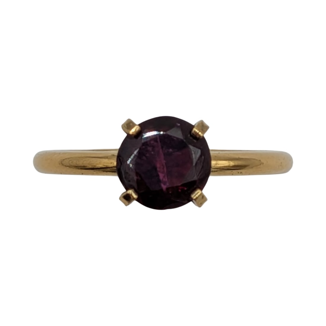 Signed Gold Over Sterling Silver Garnet Solitaire Ring Size 8: Signed Gold Over Sterling Silver, Garnet Solitaire Ring. Size 8. Signed pictograph Sterling. 2.3g