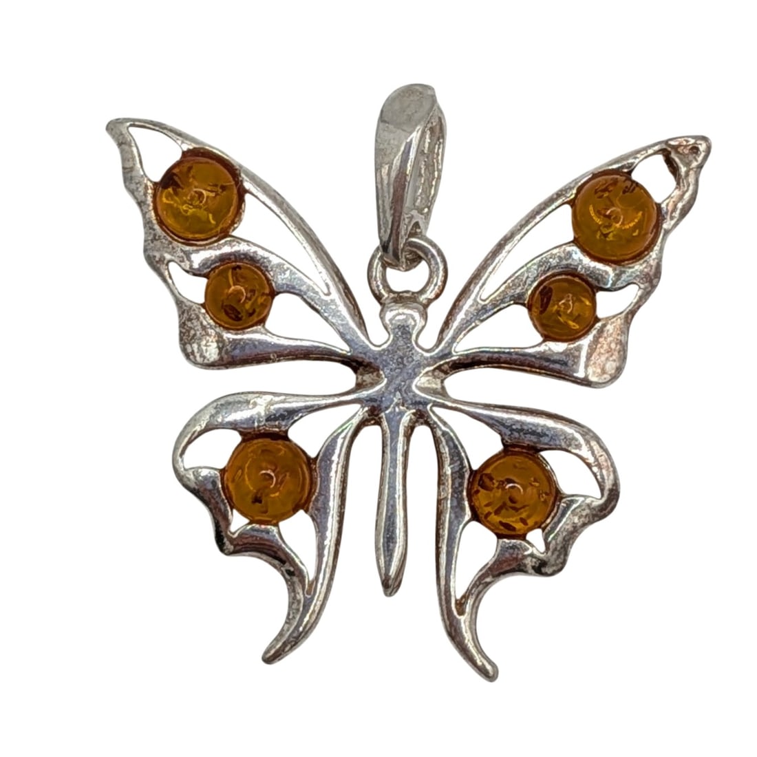 Sterling Silver Amber Butterfly Pendant: Sterling Silver Amber Butterfly Pendant. Signed 925. 2.4g