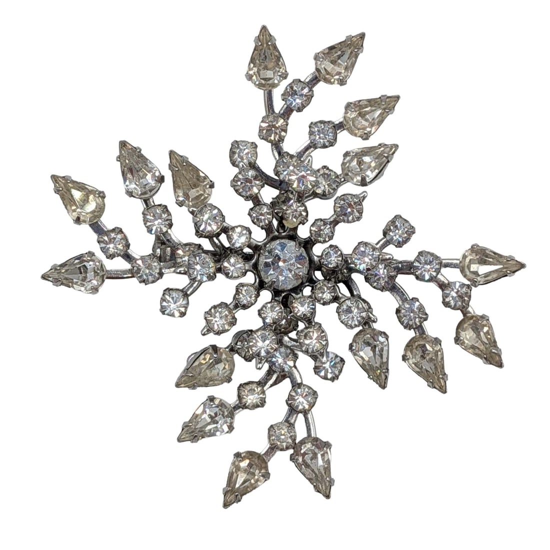 Kramer Silver Tone Rhinestone Starburst Brooch: Kramer Silver Tone Metal, White Rhinestone Starburst Brooch. Signed Kramer of New York. 15.5g