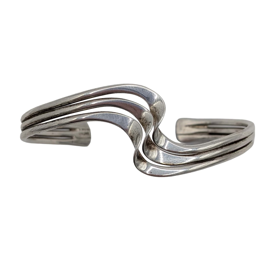 Sterling Silver Triple Wave Cuff Bracelet: Sterling Silver Triple Wave Cuff Bracelet. 5.5in Length. Signed Sterling. 15.2g