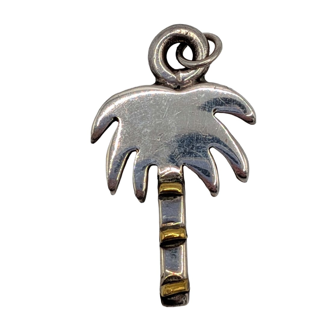 Sterling Silver Brass Raised Palm Tree Pendant: Sterling Silver, Brass Ridged Palm Tree Pendant. 3.6g