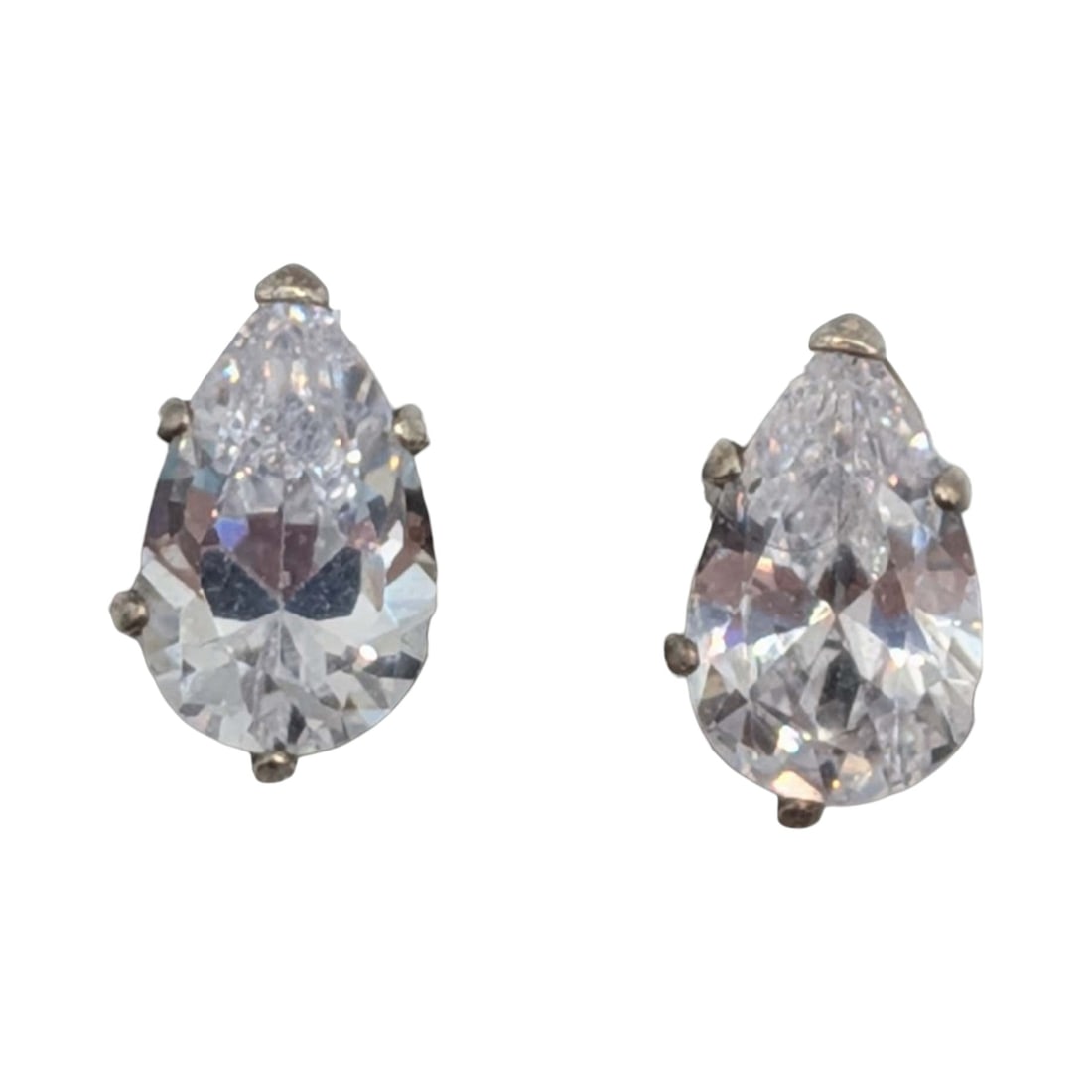 Signed Sterling Silver CZ Pear Cut Solitaire Stud Earrings: Signed Sterling Silver, CZ Pear Cut Solitaire Stud Earrings. Signed flower 925. 1g