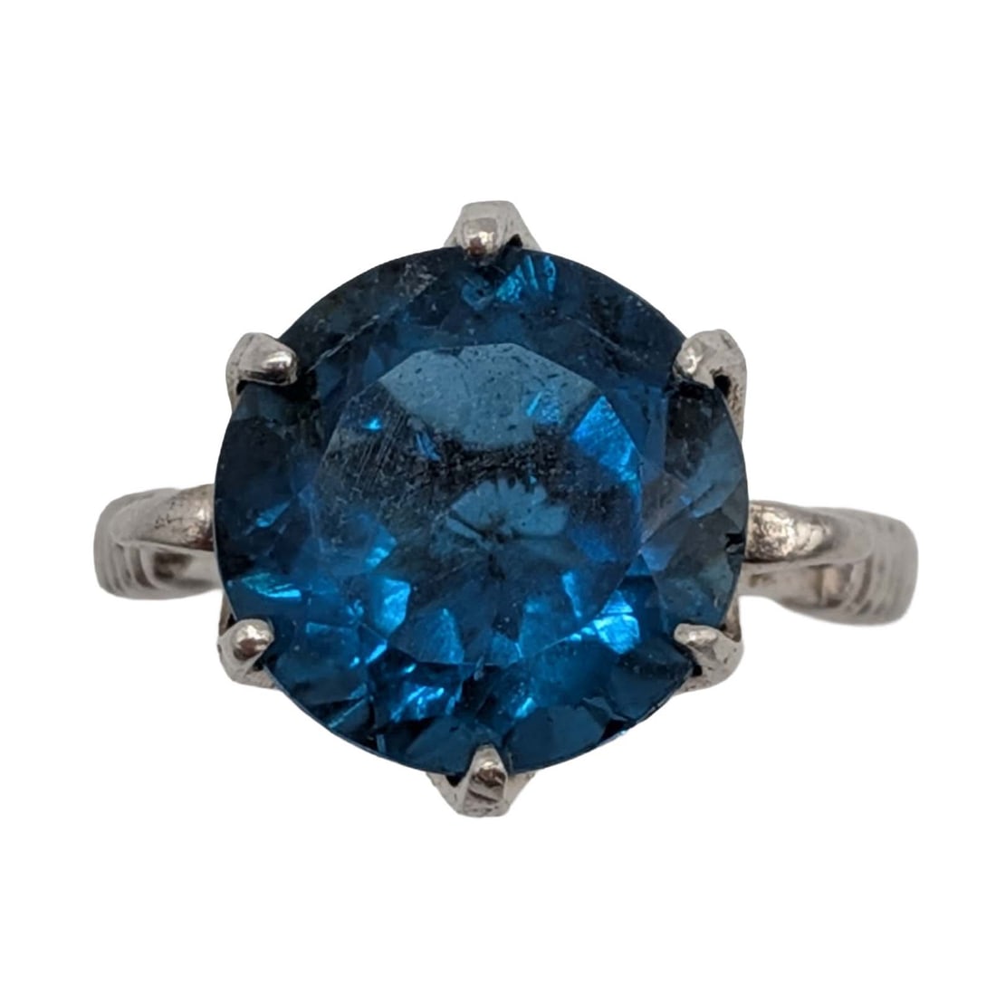 Signed Sterling Silver Blue Topaz Scroll Solitaire Ring Size 6.25: Signed Sterling Silver, Blue Topaz Scroll Solitaire Ring. Size 6.25. Signed 925 A. 2.9g