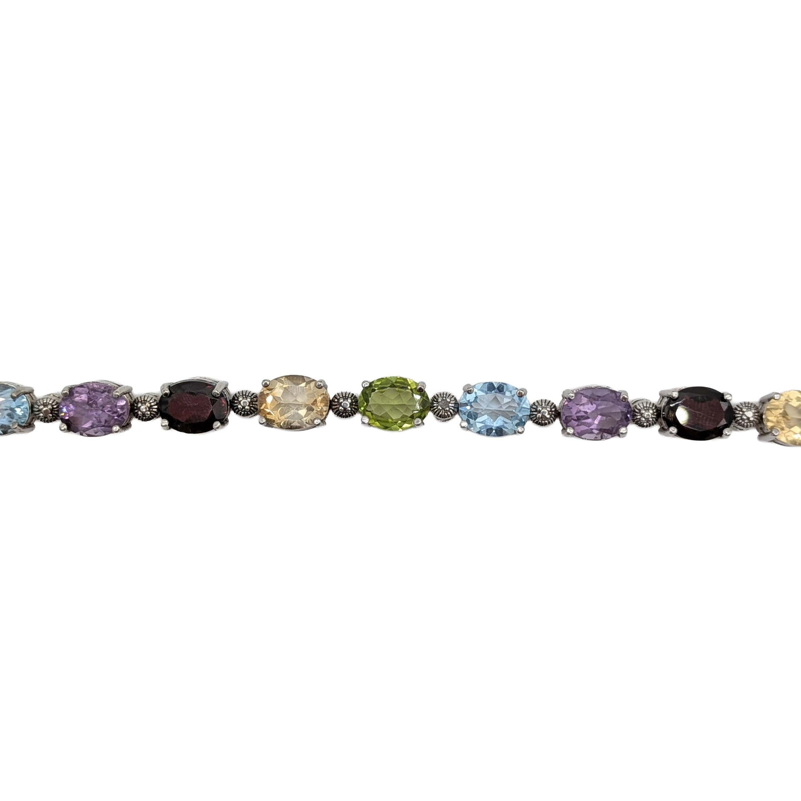 Signed Sterling Silver Oval Multi-Stone Tennis Bracelet: Signed Sterling Silver, Oval Diamond, Garnet, Amethyst, Citrine, Peridot, Topaz Tennis Bracelet. 7.25in Length. Signed FAS 925 China. 18.2g