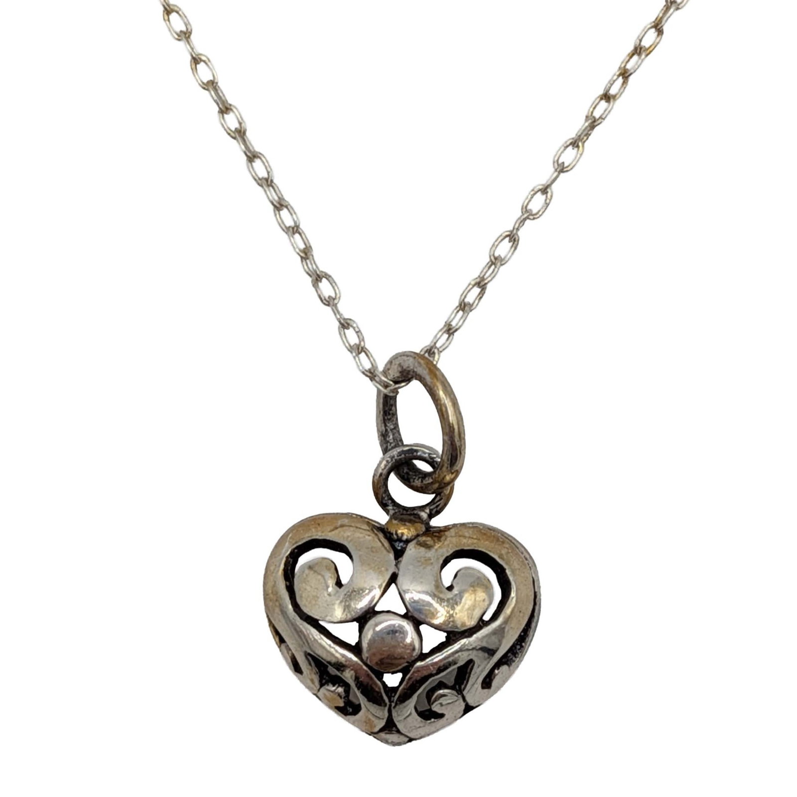Signed Sterling Silver Open Scrollwork Heart Necklace: Signed Sterling Silver Open Scrollwork Heart Necklace. 19in Length 1mm Cable Chain. Signed 925 Thailand three circles symbol. 2.2g