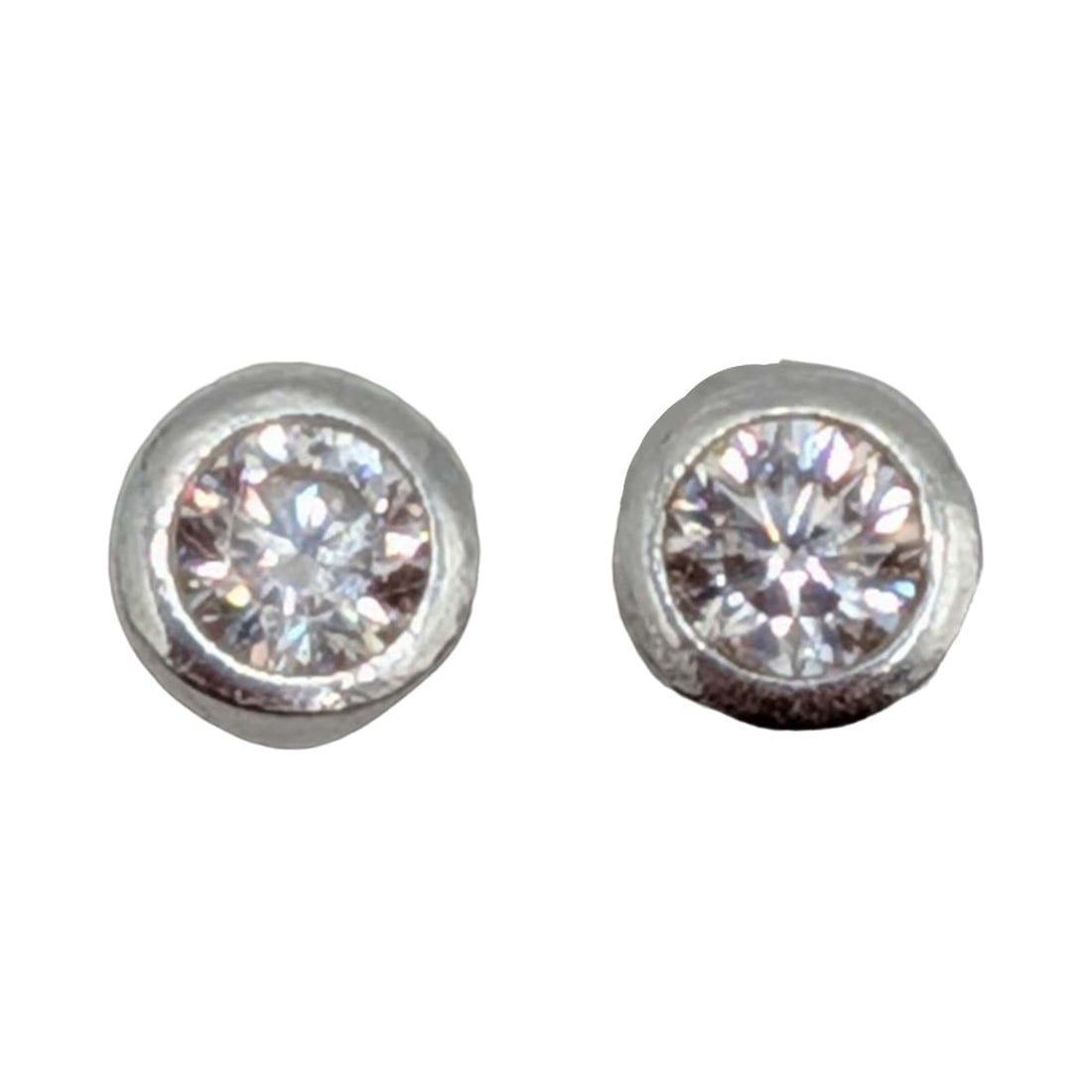 Signed Sterling Silver CZ Bezel Set Solitaire Stud Earrings: Signed Sterling Silver, CZ Bezel Set Solitaire Stud Earrings. Signed STE diamond BEE Ag 925. .6g
