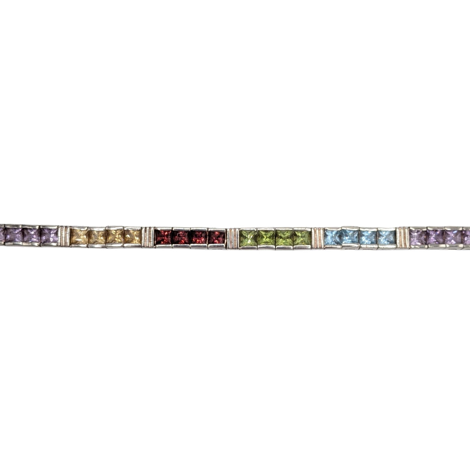 Signed Sterling Silver Multi-Stone Princess Cut Tennis Bracelet: Signed Sterling Silver, Topaz, Amethyst, Citrine, Garnet, Peridot Princess Cut Tennis Bracelet. 7.5in Length. Signed 925 wave Thailand. 19.8g