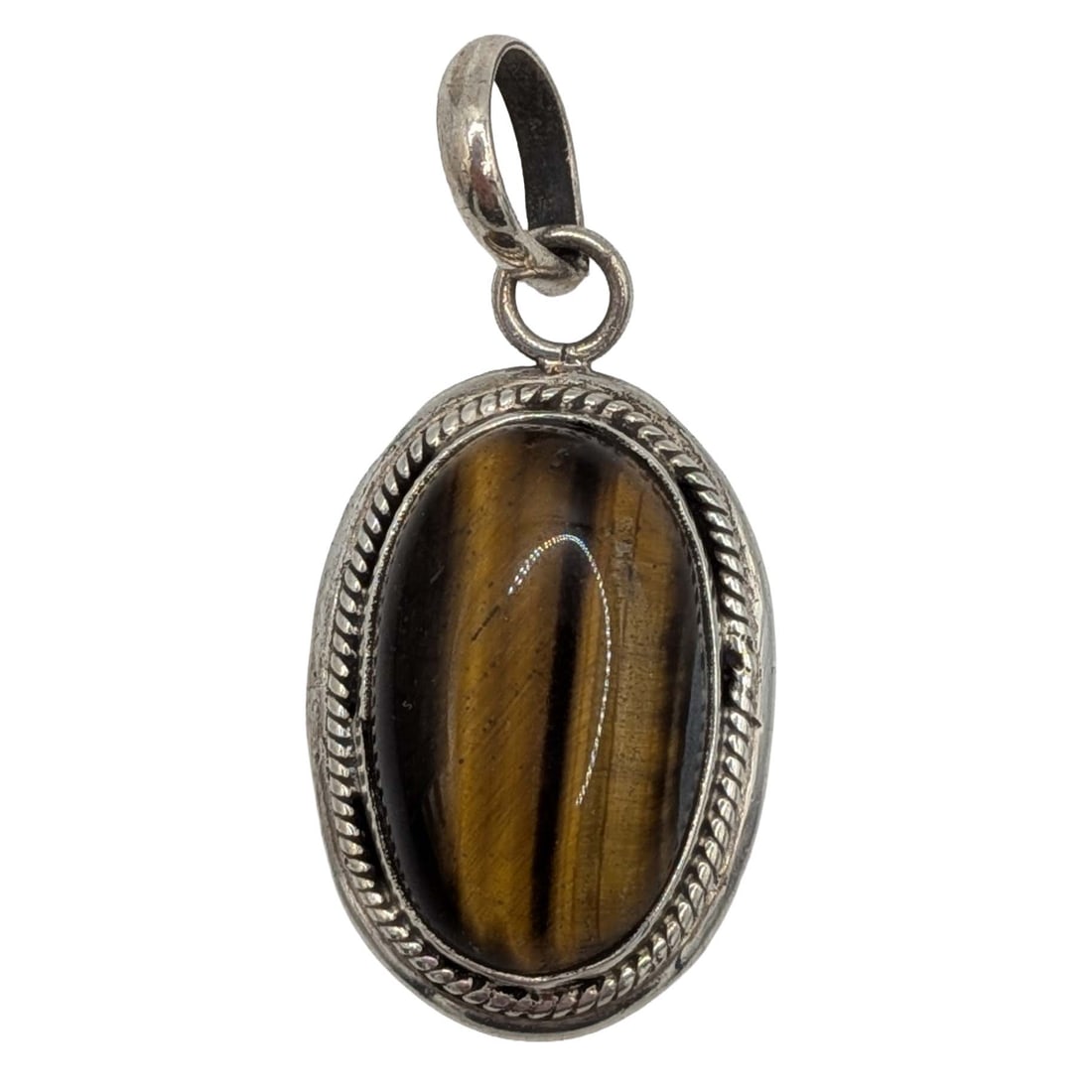 Sterling Silver Tigers Eye Bezel Set Pendant: Sterling Silver, Tigers Eye Oval Bezel Set Pendant. Signed 925. 9g
