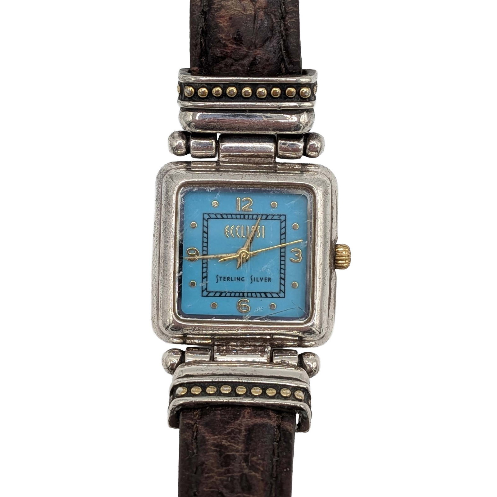 Ecclissi Sterling Silver Blue Face Square Watch: Ecclissi Sterling Silver, Leather Band, Turquoise Color Face Watch. 9.5in Length. Signed Ecclissi 22490 Sterling Silver SR626SW. 33.5g Unknown if in working condition.