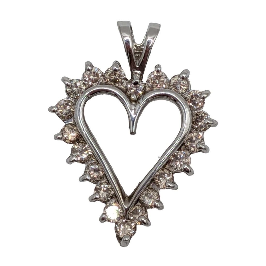 10K White Gold Diamond Open Heart Pendant: 10K White Gold, Diamond Open Heart Pendant. Signed 10K c. Approx 1.2TCW. 2.5g