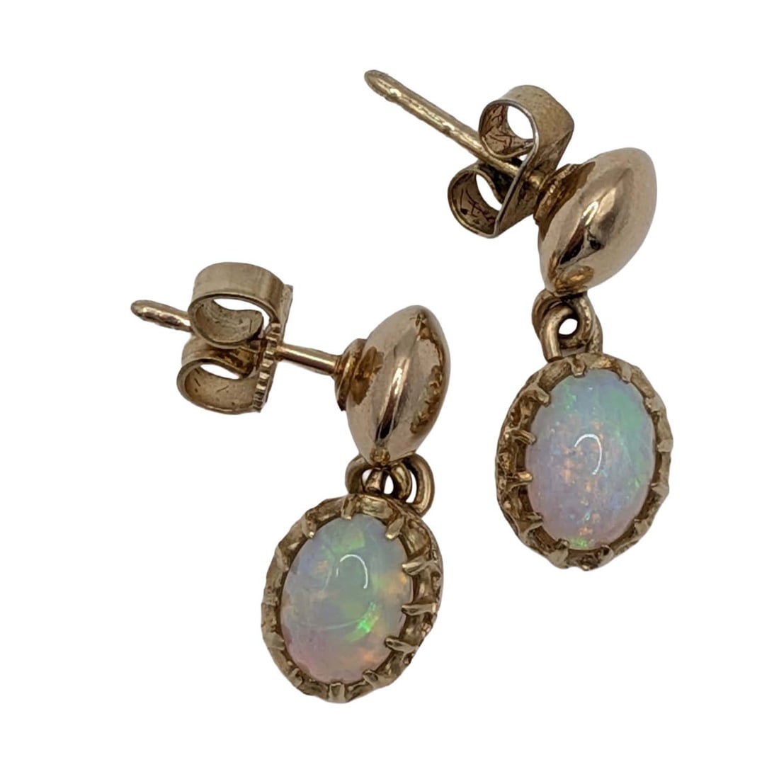 10K Yellow Gold Opal Dangle Stud Earrings: 10K Yellow Gold, Opal Dangle Oval Stud Earrings. Signed 10KT. Approx 1.5TCW. 2.3g