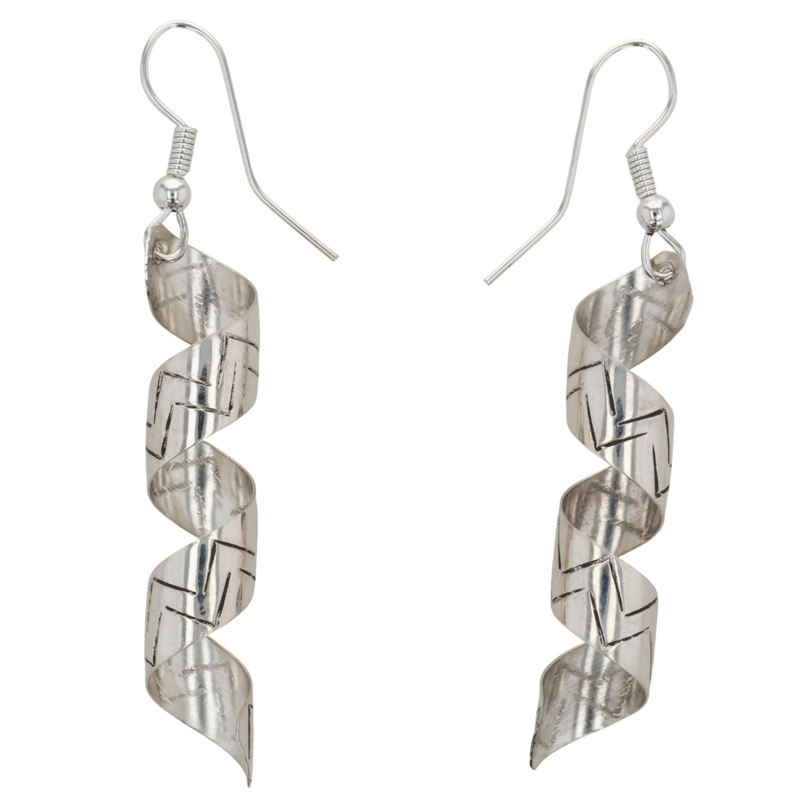 Florence Tahe Navajo Sterling Stamped Spiral Earrings: Florence Tahe Navajo Sterling Stamped Spiral Earrings / 3g / Unsigned. Artist attribution based on accompanying tag.