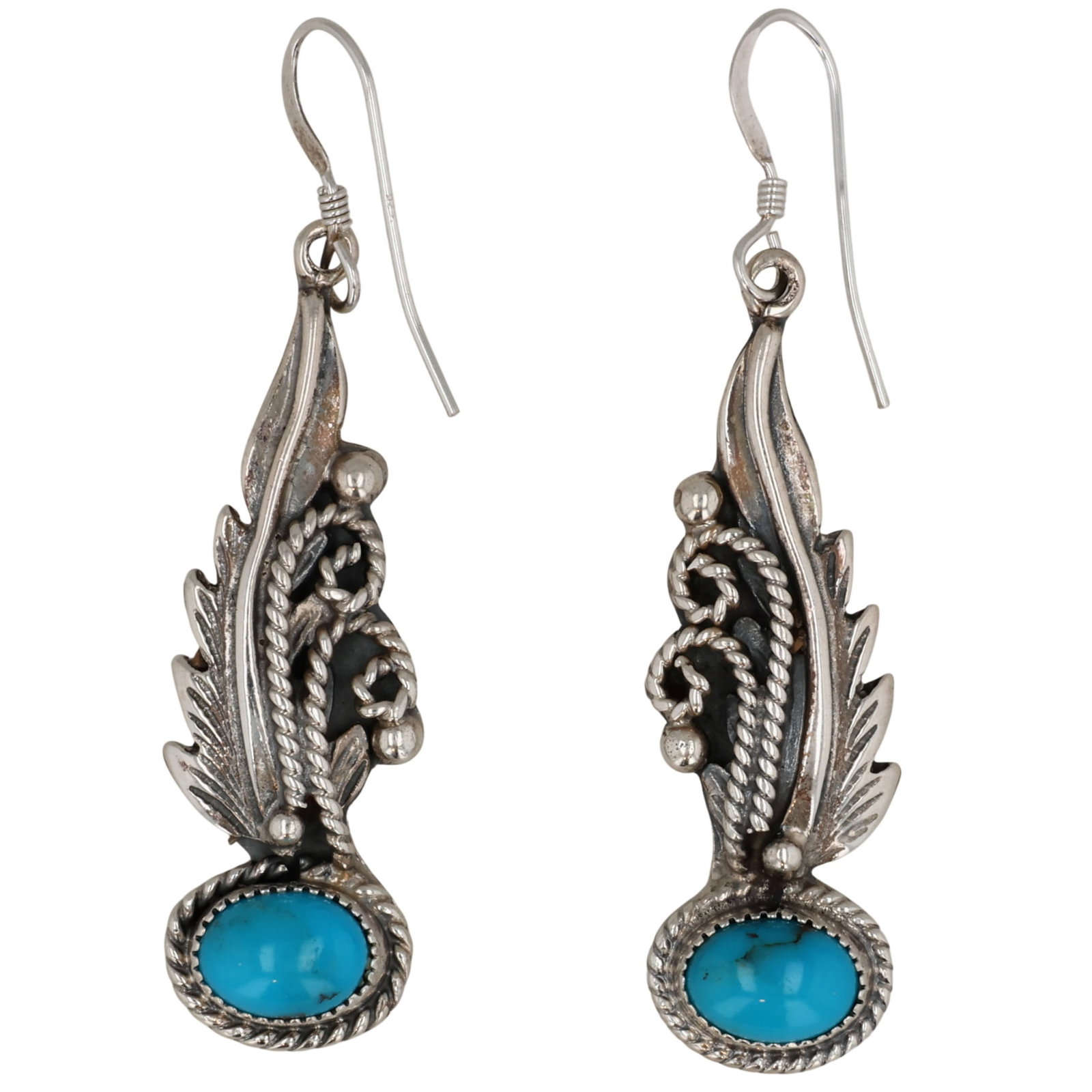 Judy Largo Navajo Sterling Turquoise Feather Earrings: Judy Largo Navajo for Running Bear Shop Sterling Turquoise Feather Earrings / 7g / Unsigned by artist. Artist attribution based on accompanying tag.