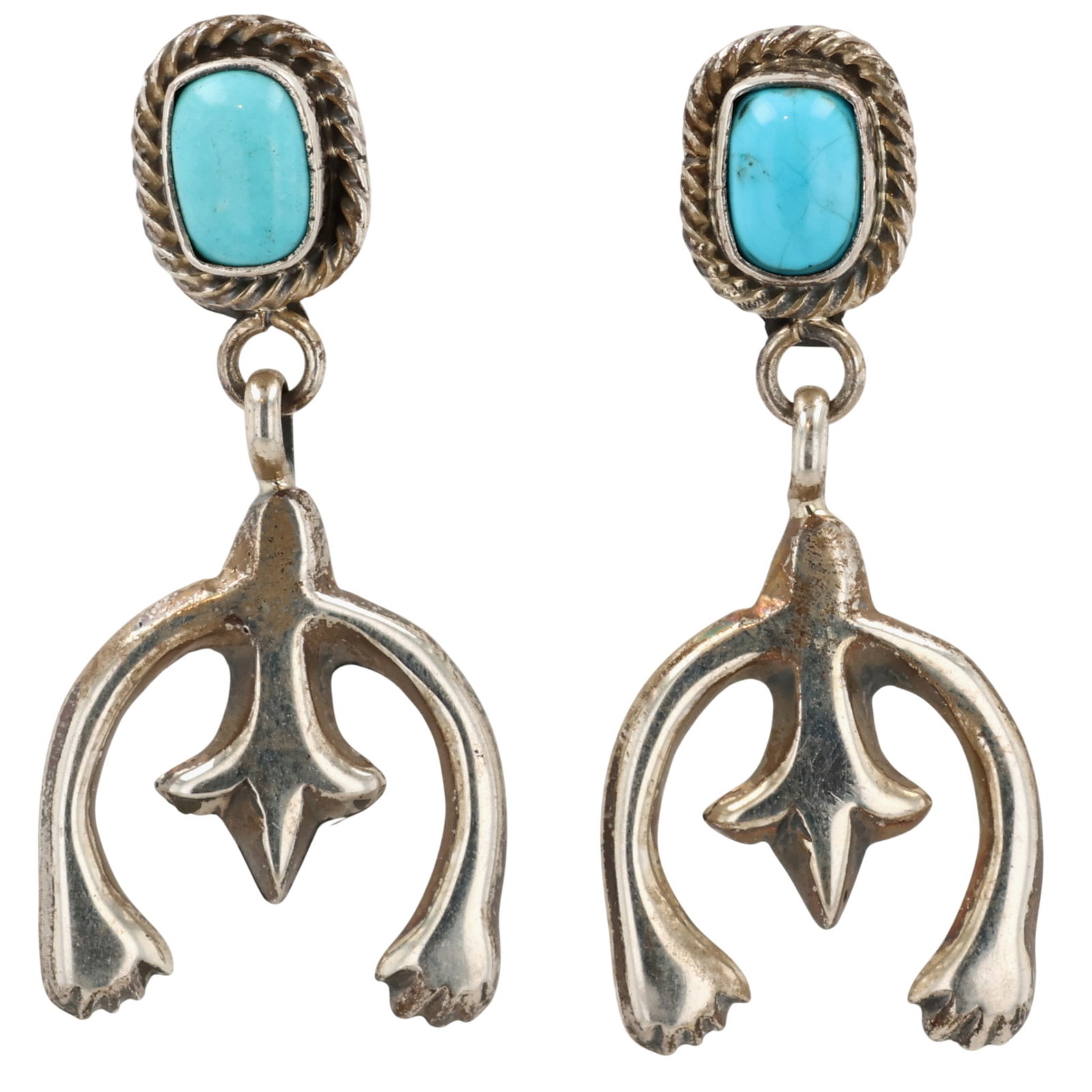 Verley Betone Navajo Sterling Kingman Turquoise Naja Earrings: Verley Betone Navajo for Running Bear Shop Sterling Kingman Turquoise Naja Earrings / 5.5g / Unsigned by artist. Artist attribution based on accompanying tag.