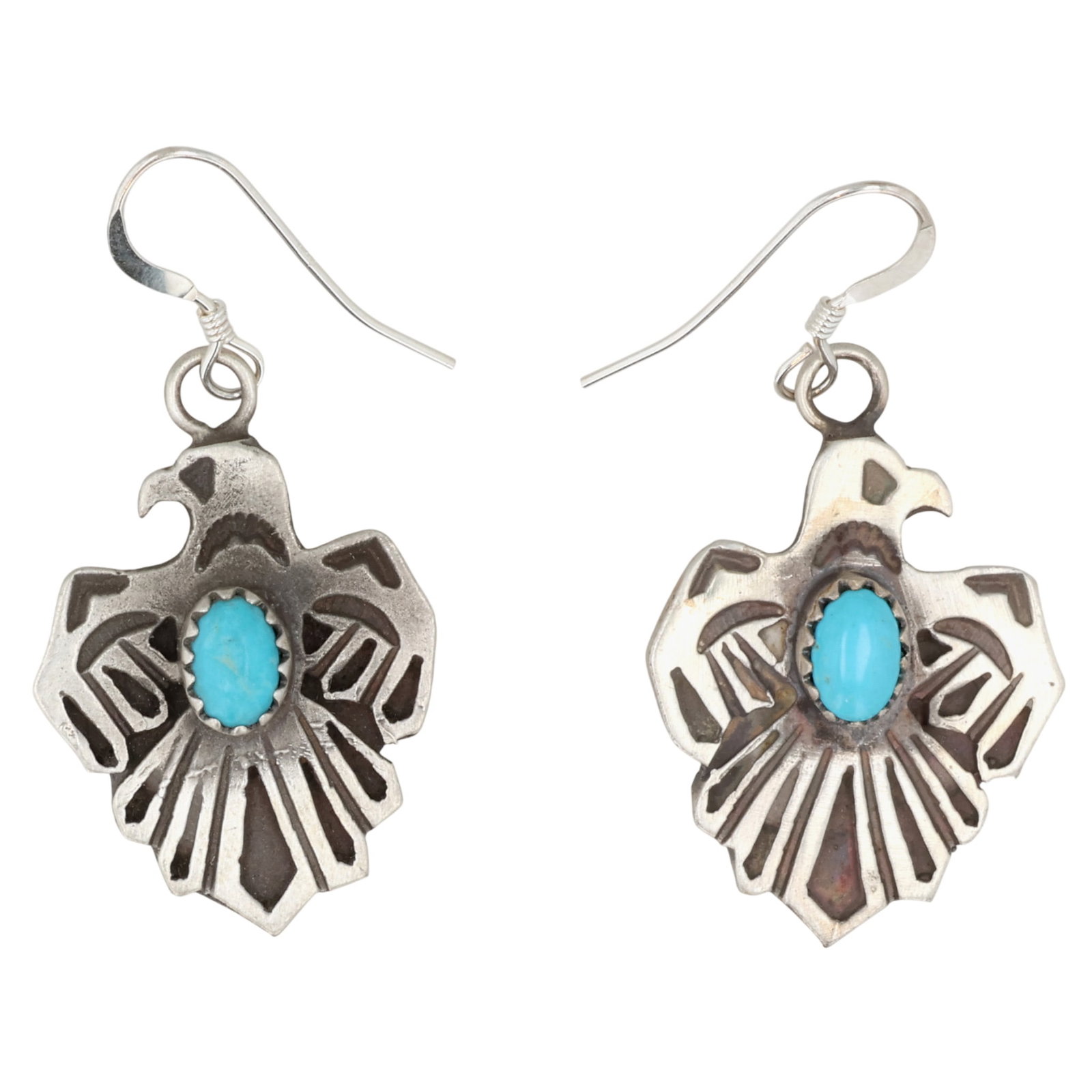 Genevieve Jones Navajo Sterling Turquoise Thunderbird Earrings: Genevieve Jones Navajo for Running Bear Shop Sterling Turquoise Thunderbird Earrings / 9.5g / Unsigned by artist. Artist attribution based on accompanying tag.