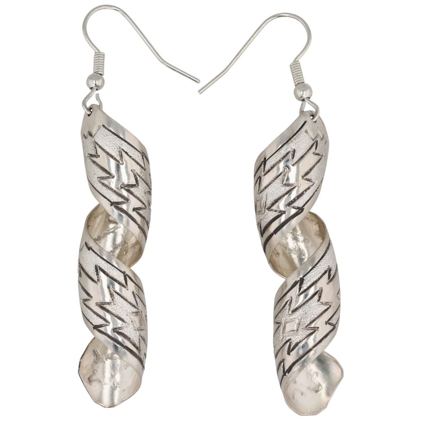 Florence Tahe Navajo Sterling Stamped Spiral Earrings: Florence Tahe Navajo Sterling Stamped Spiral Earrings / 7.5g / Unsigned. Artist attribution based on accompanying tag.