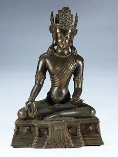 A bronze seated Buddha statue: A bronze seated Buddha statue of unknown origin and date of manufacture.