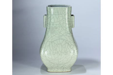 A rectangular celadon crackle-glazed porcelain vase: A rectangular celadon crackle-glazed porcelain vase, decorated with double pierced ears. Qianlong six-character seal inscription on the bottom.