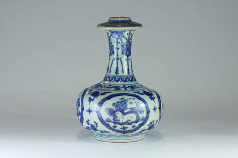 A blue-and-white hand-cleaning porcelain vase: Late Ming Dynasty blue-and-white hand-cleaning porcelain vase with turned-out mouth, decorated with trees, rocks and animals.