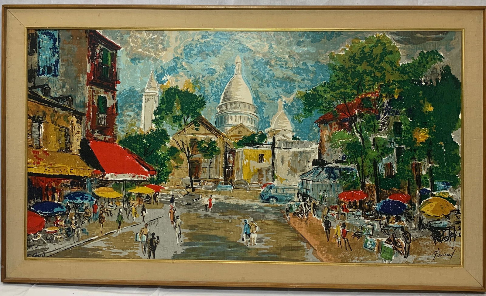 Pascal Cucaro, American (1915-2004) Oil on Canvas: A painting of a busy street scene by Pascal Cucaro. It measures 27 1/2 x 51 1/4 in. sight size, w/ frame 33 1/4 x 57 in.