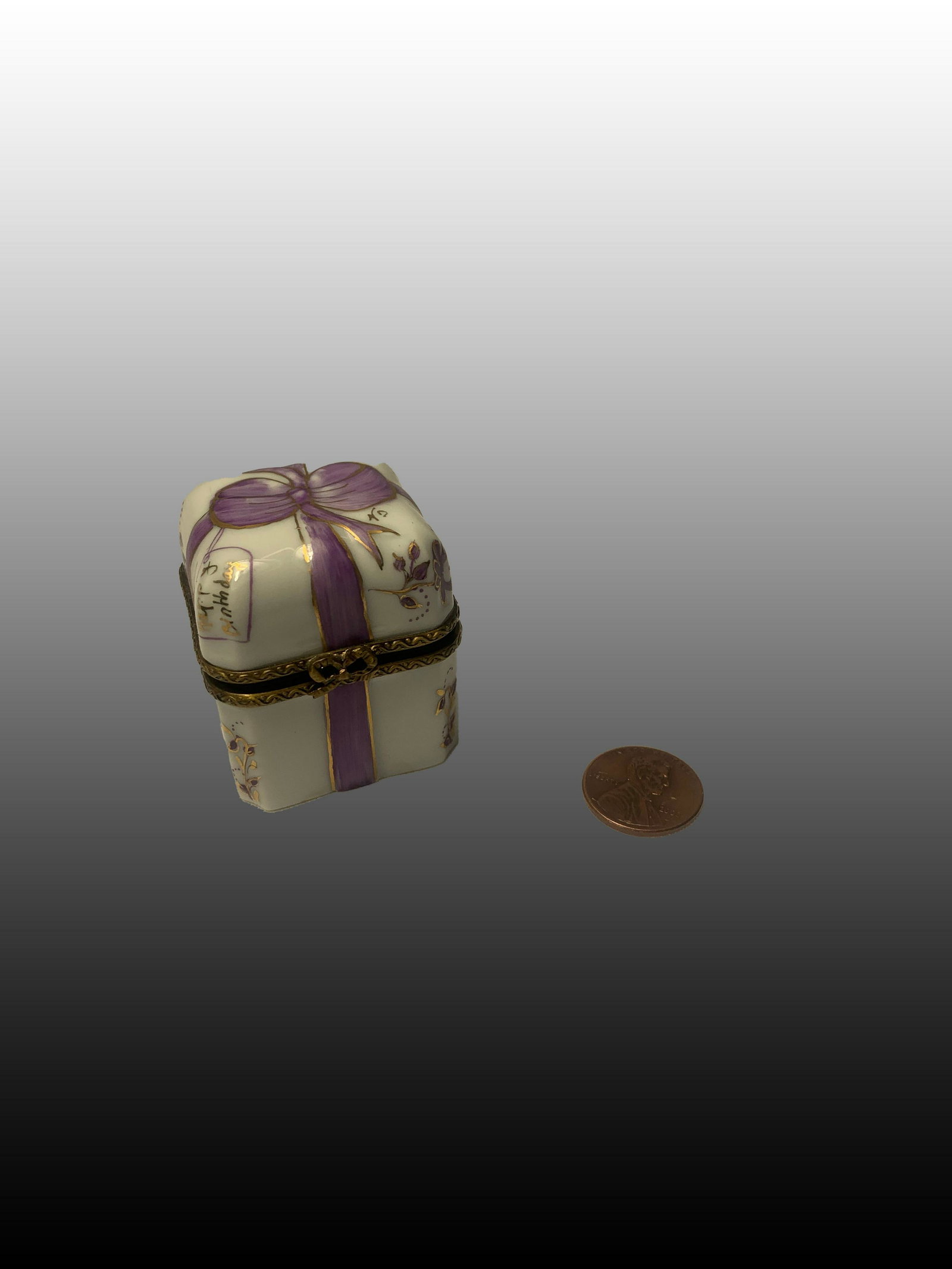Limoges Box with Original Bottles: An unusual limoges box with four tiny original bottles.