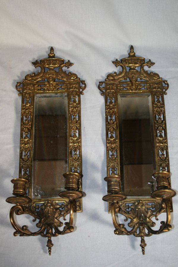 Pair of 20thc Brass Candle Sconces: A matched pair of fancy brass candle sconces