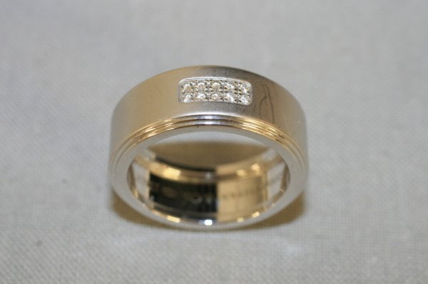 Tiffany & Co. 14Kt White Gold Diamond Ring: In its original box and weighing 6.8 dwt