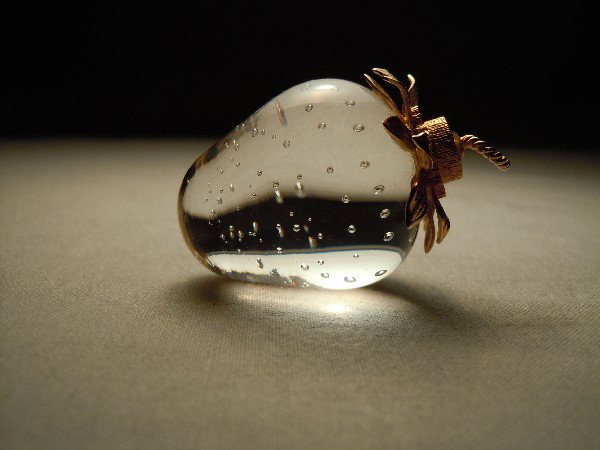 Steuben Crystal Strawberry Pendant: The pendant is designed by Earl Stampp. Pendant length is 2."