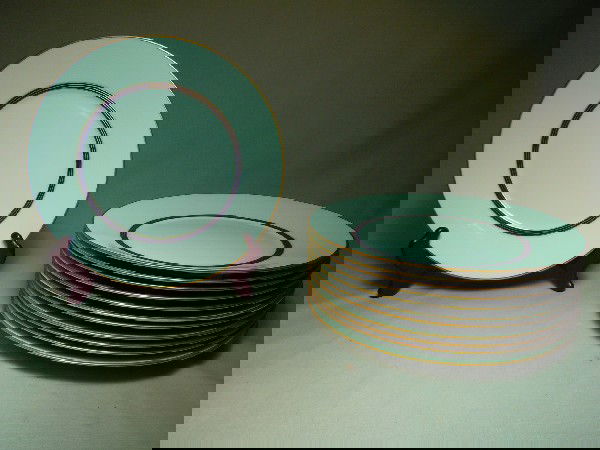 Bernardaud Limoges China, "Palatino": Comprising of twelve dinner plates. Palatino pattern in Navy and Gold trim.