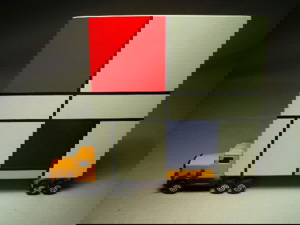 Bruce Houston, Mondrian Truck: "Mondrian Truch" is a painted wood truck signed and dated, 1987. Truck measures, 9" x 10" x 1 1/2".