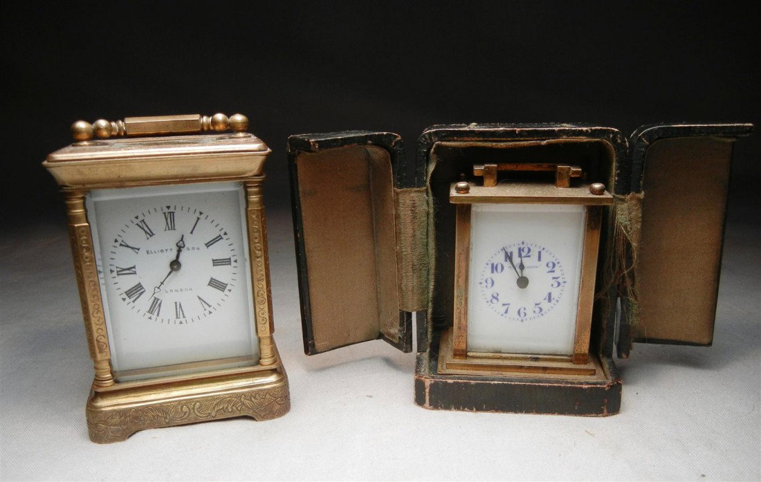 Elliot & Son and Mignon Carriage Clocks: FRENCH MIGNON CARRIAGE CLOCK WITH WOOD CASE: Diminutive clock by Mignon with brass case and beveled glass on 3 sides. Wind mechanism. Comes with original wood protective case with green leather cover.