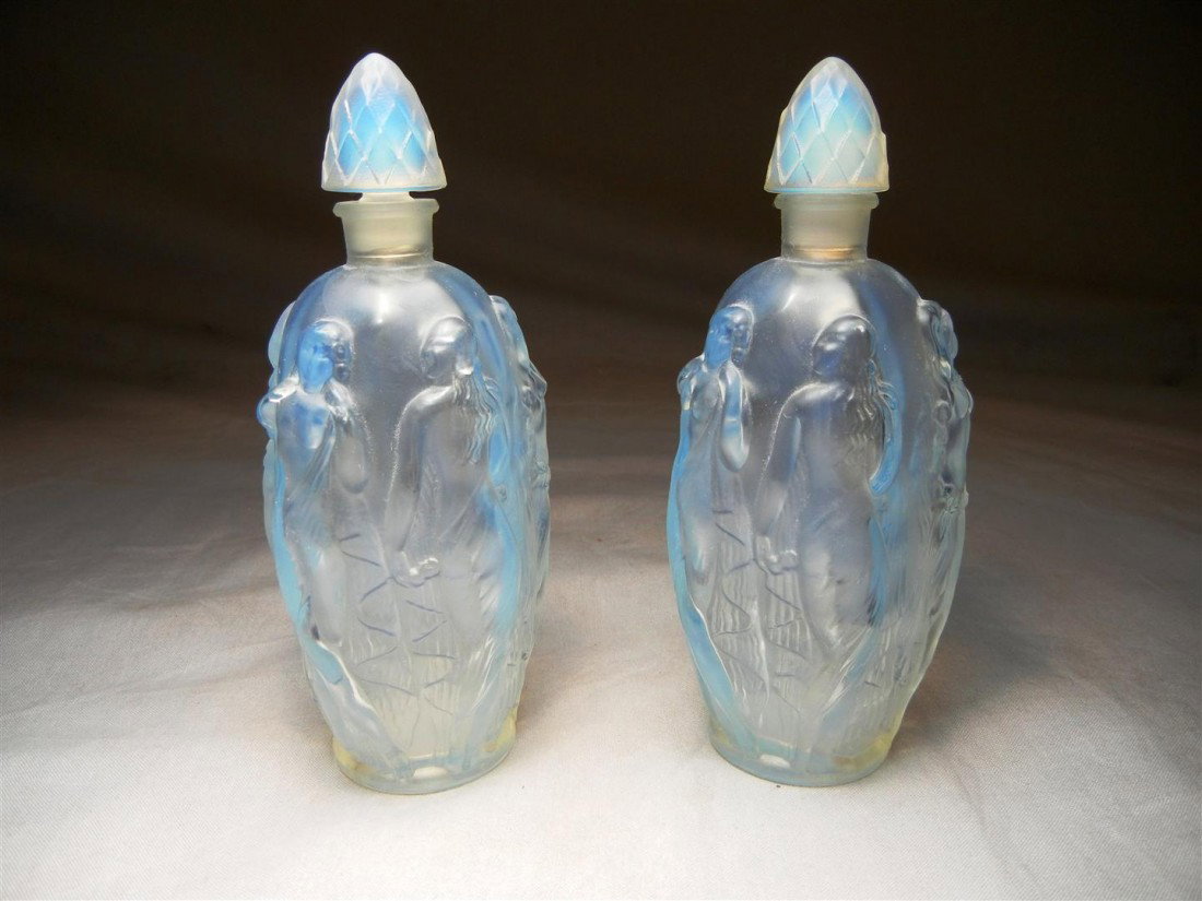 Pair of Sabino Perfume Bottles: Pair of Sabino Paris opalescent nudes perfume bottles. Both have been marked on bases (see photos).