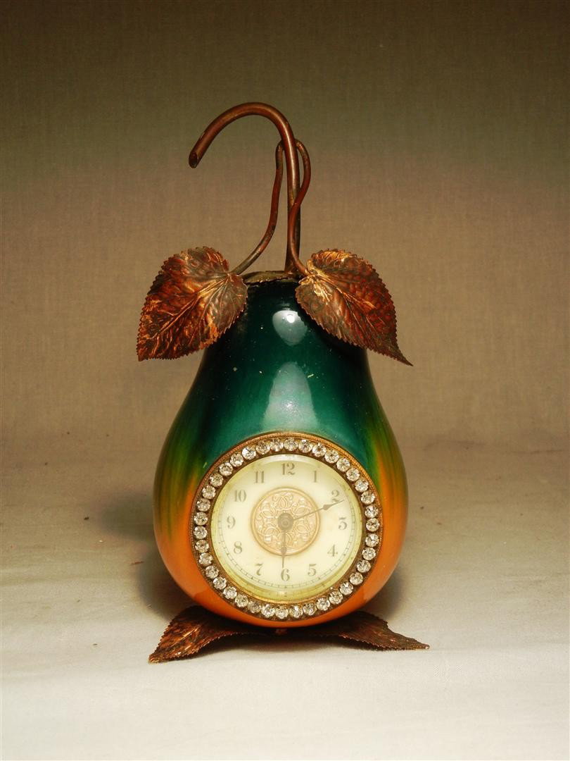 French Enamel & Paste Pear Shaped Clock: A unique French enamel & paste pear shaped clock. Clock measures 7 1/2"H.