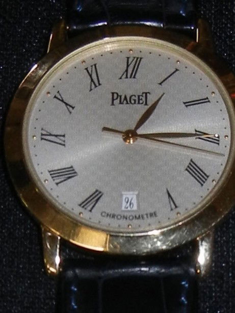 Gent's 18K(750) Piaget Automatique Wrist Watch: 18K (750) Piaget Automatique Chronometre men's wrist-watch circa 2000 with leather band and 18K buckle.
