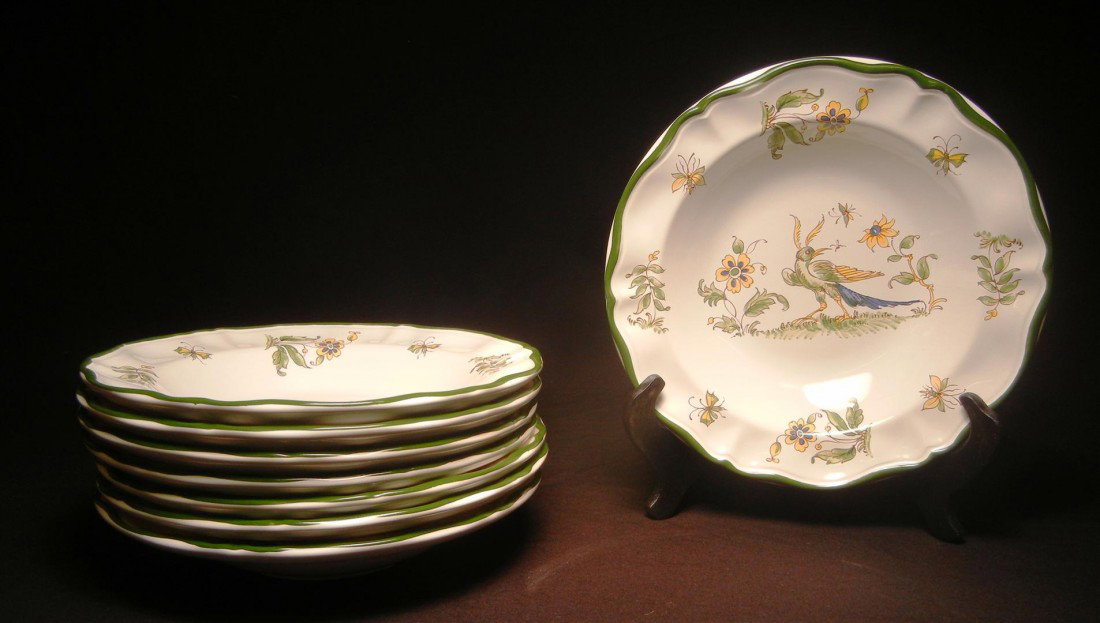 Varages France Faience Bowls: Eight Moustiers style French faience bowls by Varages, France. Rare pattern featuring the bird motif is retired from the Varages line. Signed on reverse, Varages (see photos). Bowls measure 9 1/4"