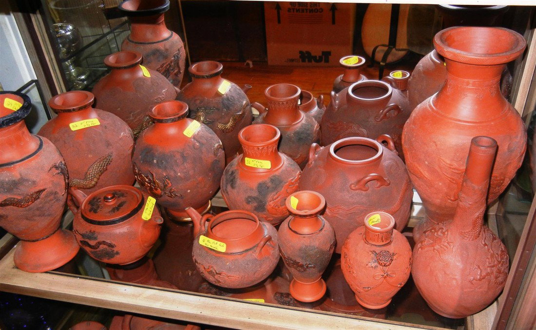 11 Pieces of Japanese Tokoname Ware: An assortment of 11 antique Japanese tokoname ware pieces consisting of vases, pots, and pitchers