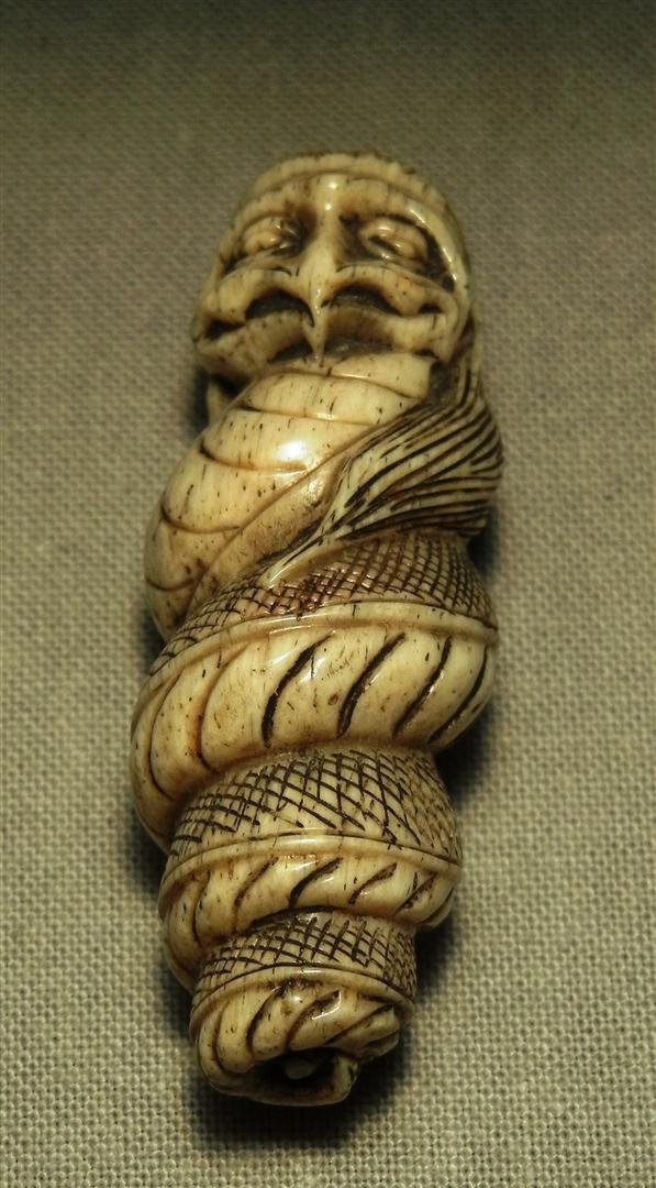 19thc. Ivory Netsuke: 19th century ivory netsuke of a coiled serpent measuring 2."