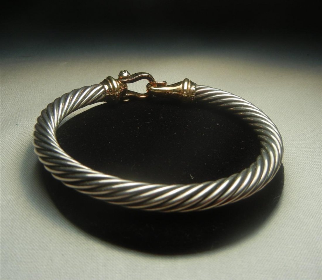 David Yurman 14KYG & Silver Bracelet: David Yurman 14KYG and sterling silver twisted bangle bracelet c. 1990.