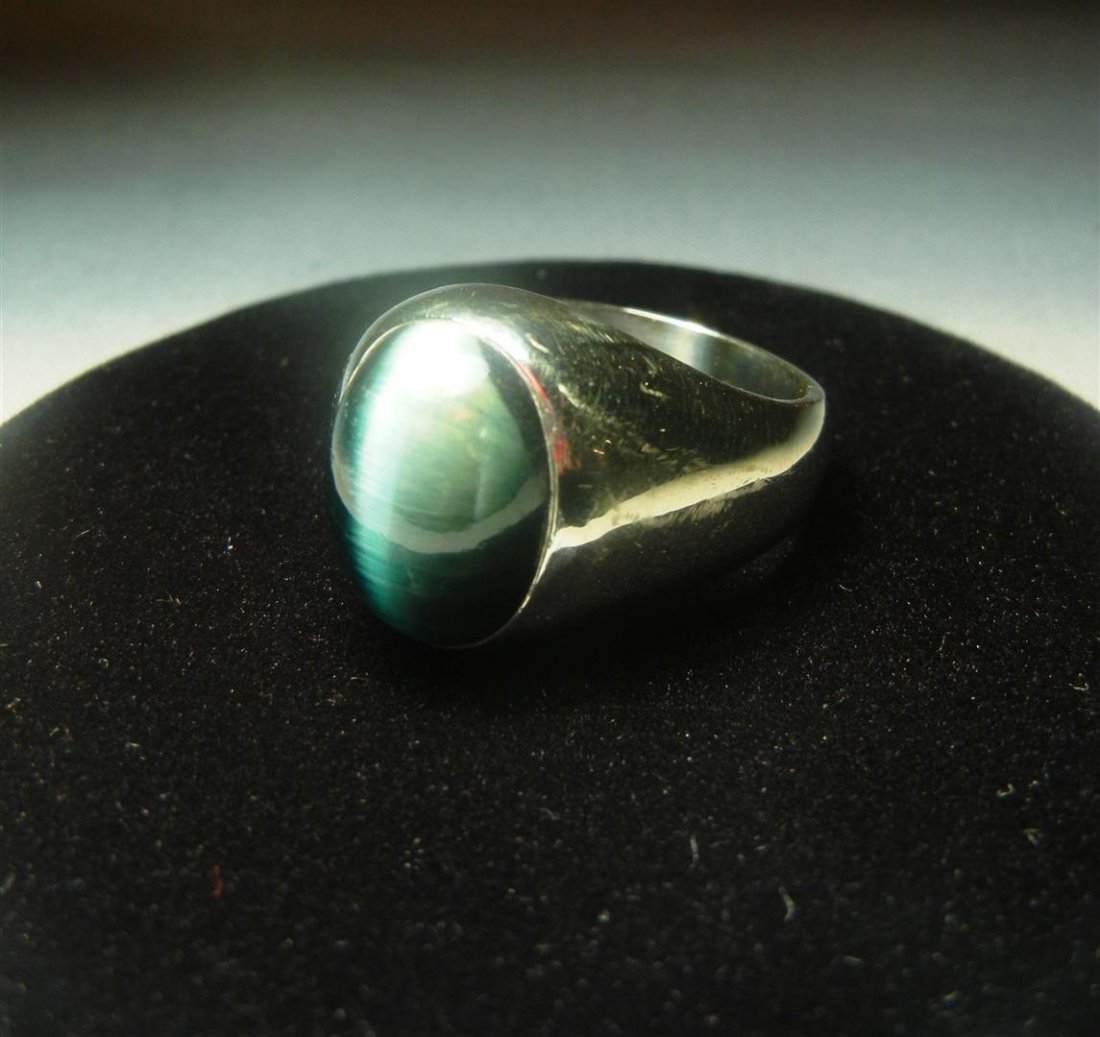 14K Signed Cat's Eye Gent's Ring: Signed 14k gold cat's eye gent's ring weighing 11.95 dwt (total gross weight). Ring size is approx. 8 1/2-9.