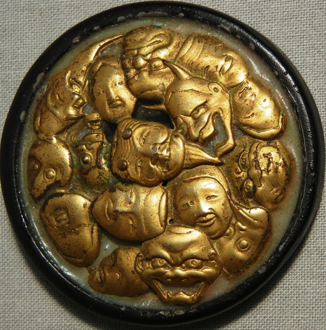 Japanese Bronze Casting on Stone: Japanese bronze mounted casting on stone measuring 2 1/4" in diameter.