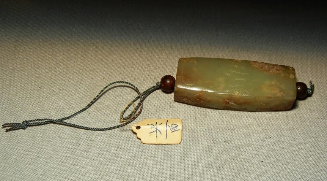 19thc. Chinese Jade Toggle with Amethyst: 19thc. Jade toggle with amethyst balls on either side of toggle measuring 2 1/2" long.